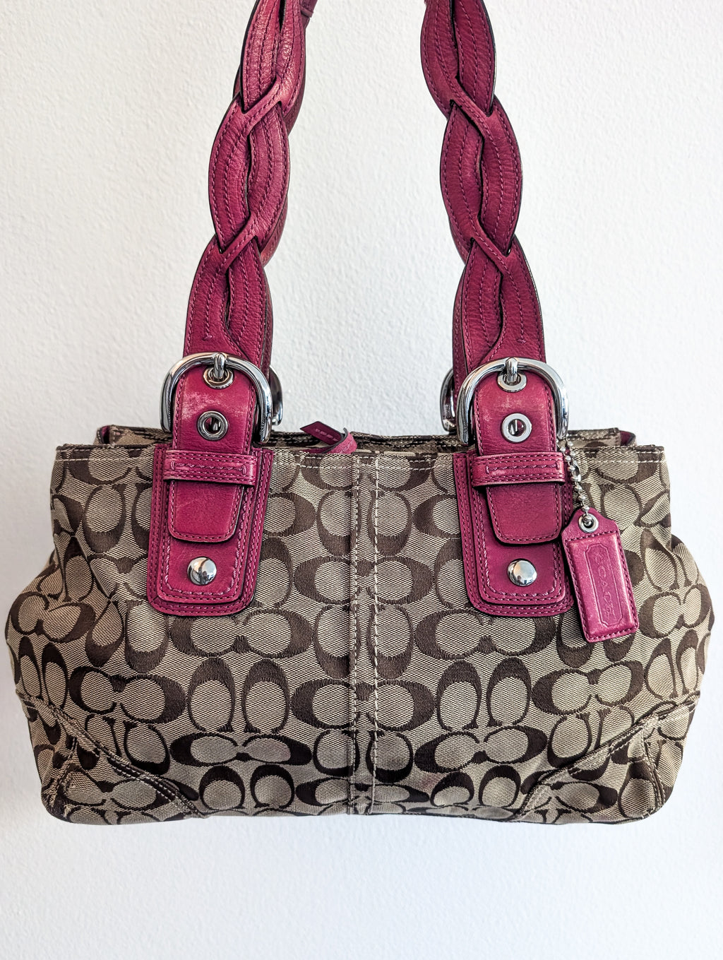 Coach Signature tote handbag with pink braided handles