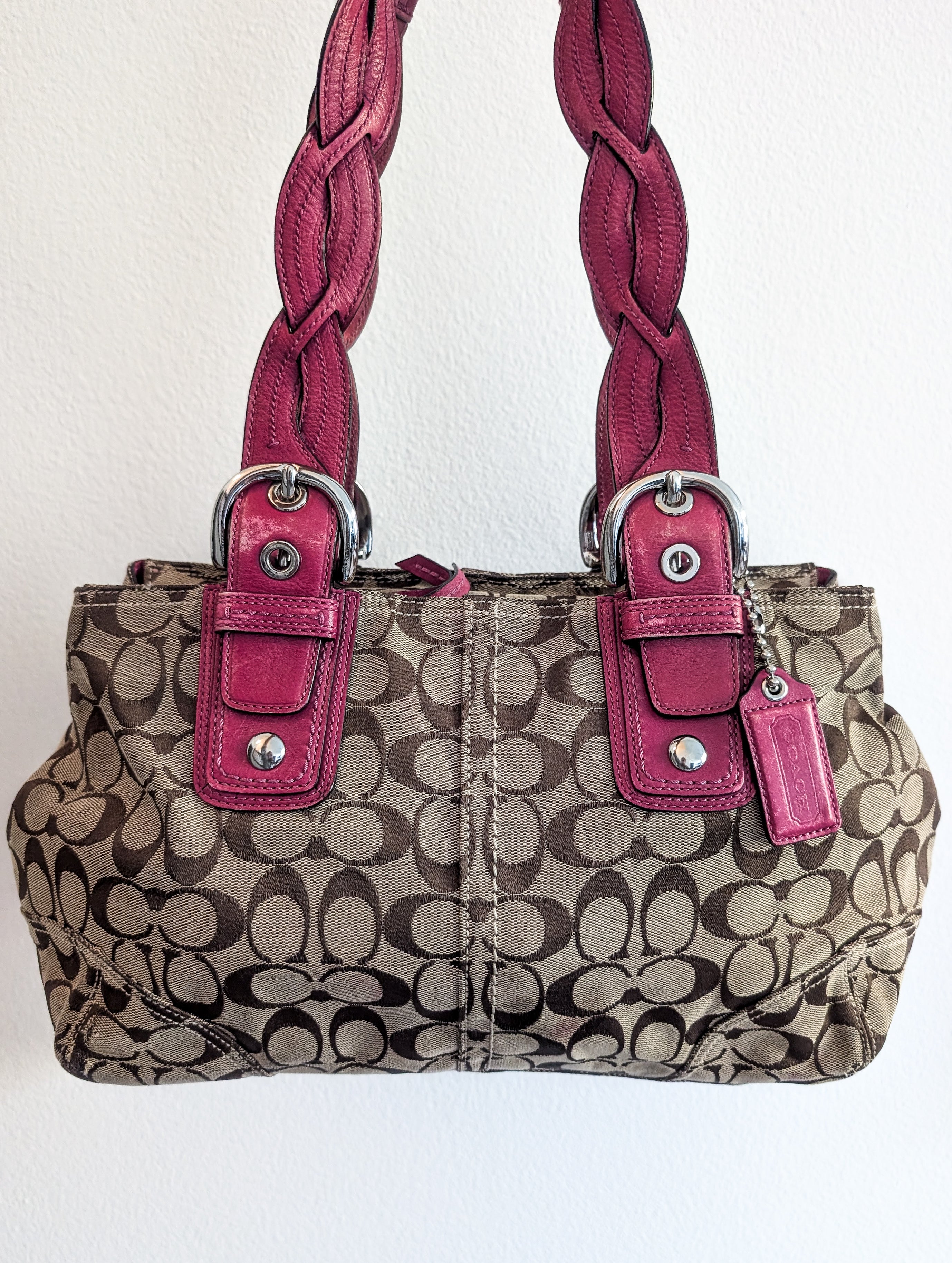 Coach Signature tote handbag with pink braided handles