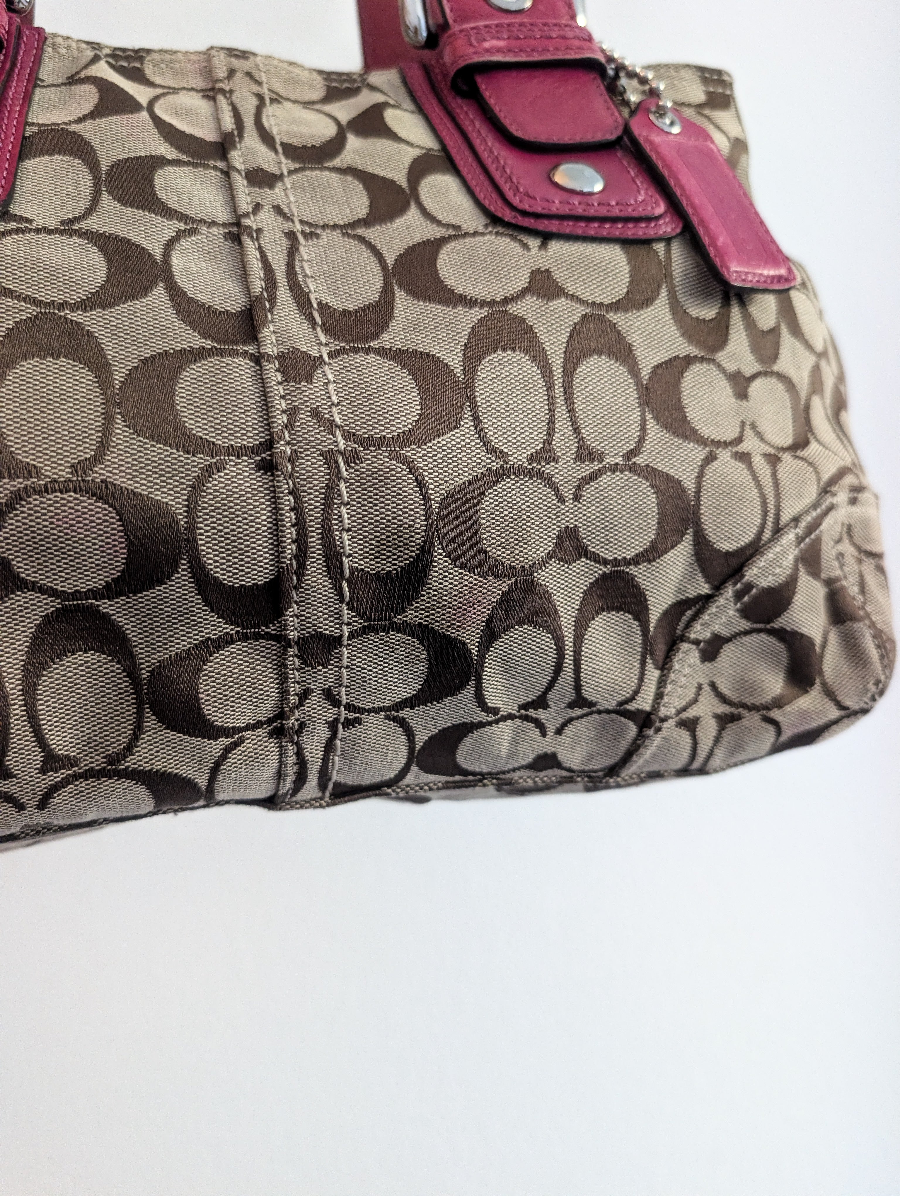 Coach Signature tote handbag with pink braided handles