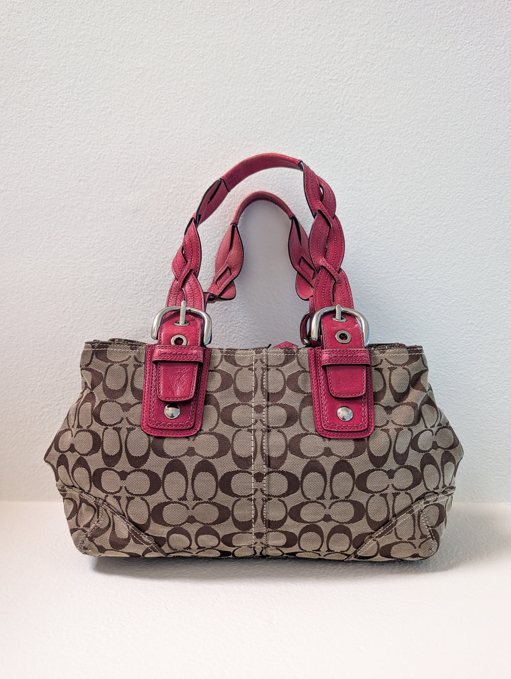 Coach Signature tote handbag with pink braided handles